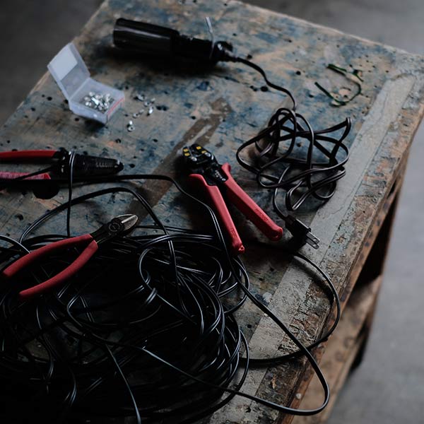A workbench full of holes