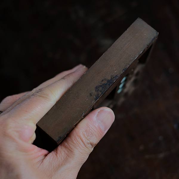 A stamped copper block