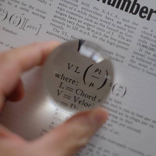 Small dome-shaped tabletop magnifying glass