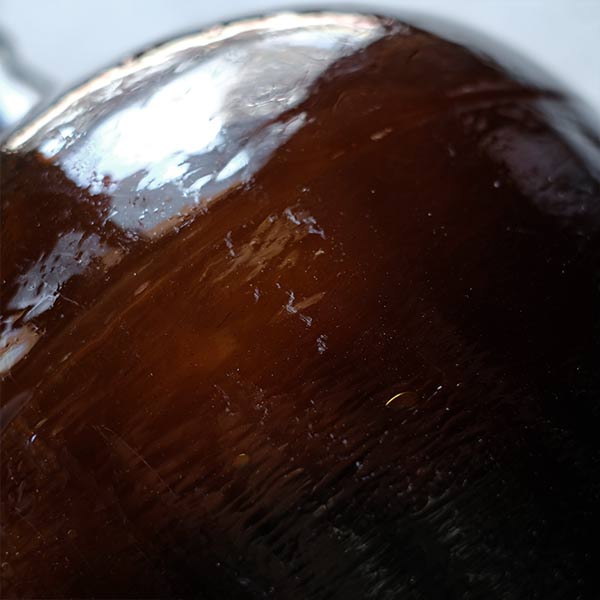 Amber demijohn bottle