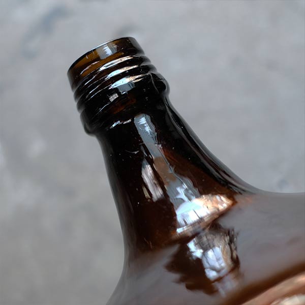 Amber demijohn bottle