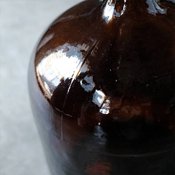 Amber demijohn bottle