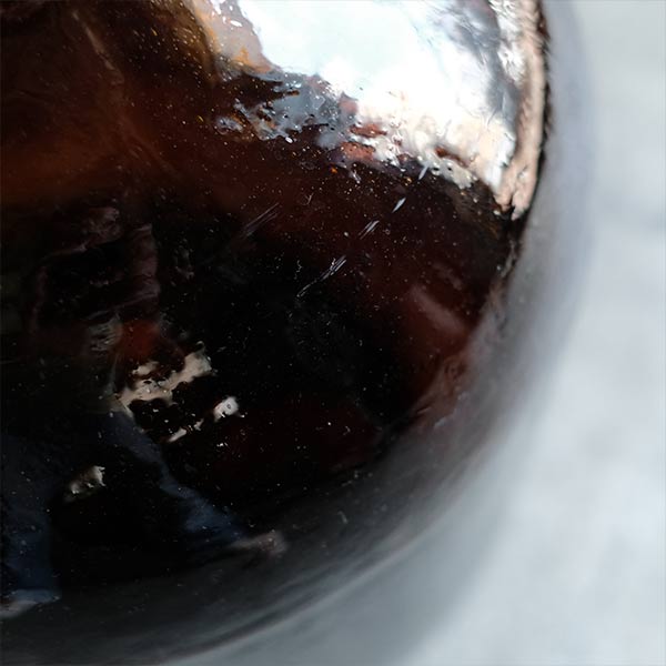 Amber demijohn bottle