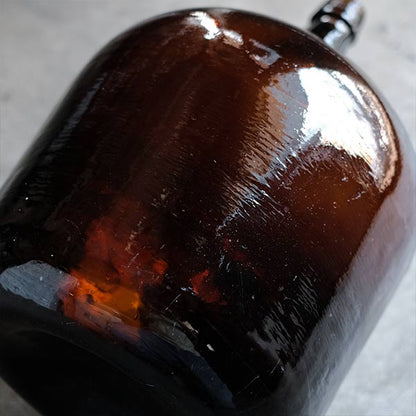 Amber demijohn bottle