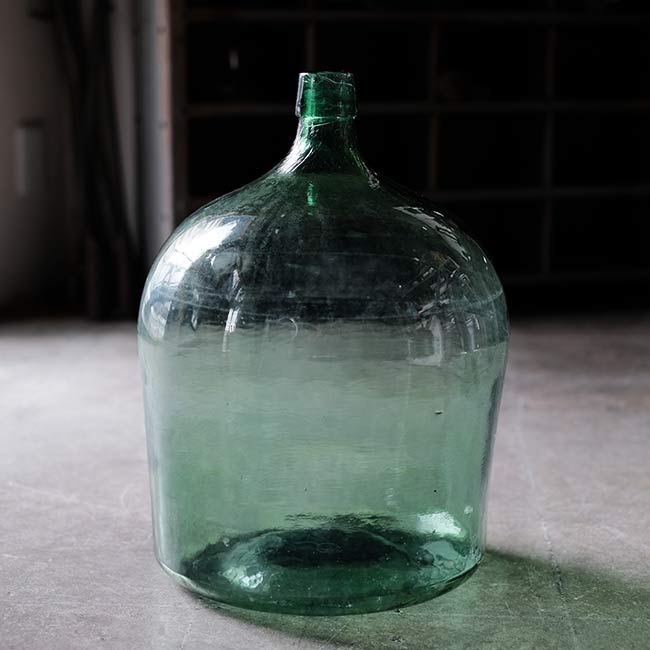 Aqua green demijohn bottle