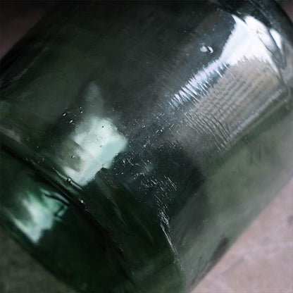 Aqua green demijohn bottle