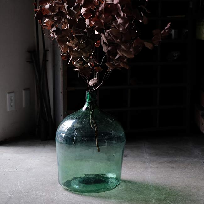 Aqua green demijohn bottle