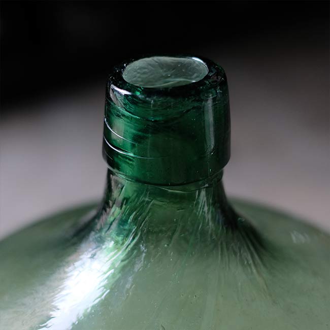 Aqua green demijohn bottle