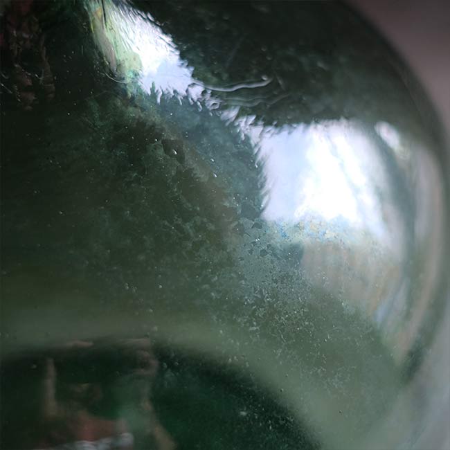 Aqua green demijohn bottle