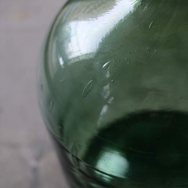 Aqua green demijohn bottle