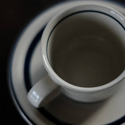 Stoneware cup and saucer