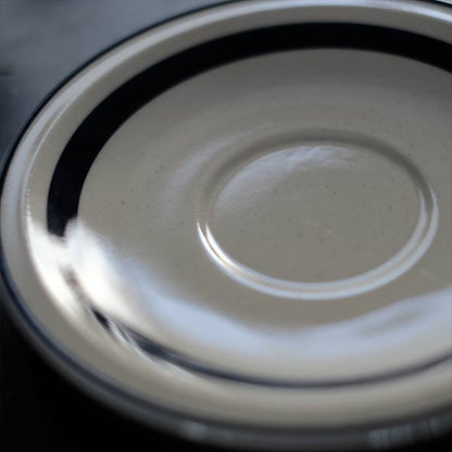 Stoneware cup and saucer