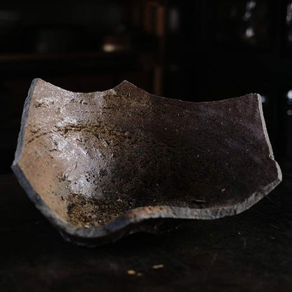 the bottom of a broken pot