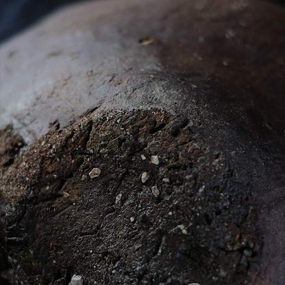 the bottom of a broken pot