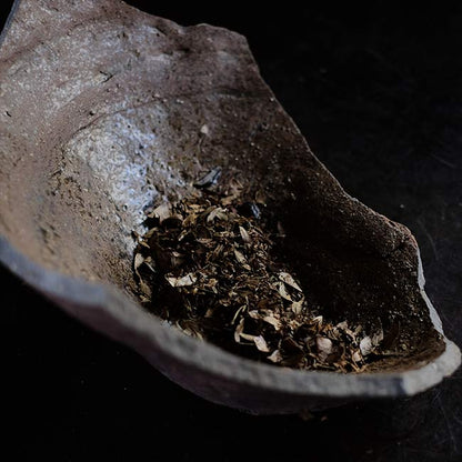 the bottom of a broken pot