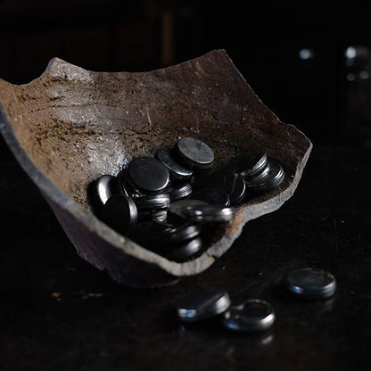 the bottom of a broken pot