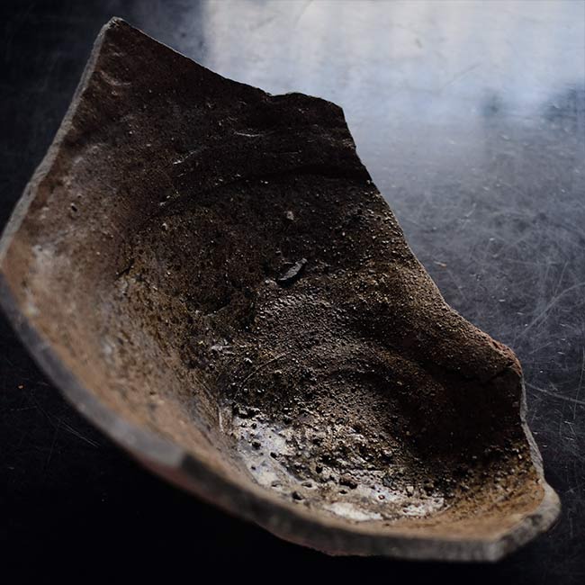 the bottom of a broken pot