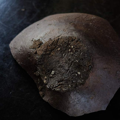the bottom of a broken pot