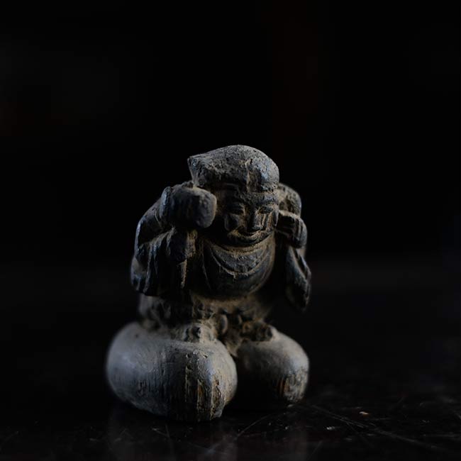 Wooden carving of Daikoku