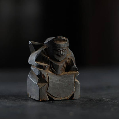Wooden carving of Ebisu