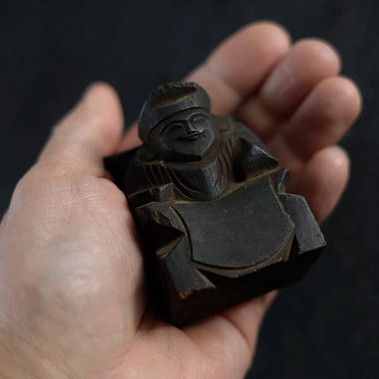 Wooden carving of Ebisu