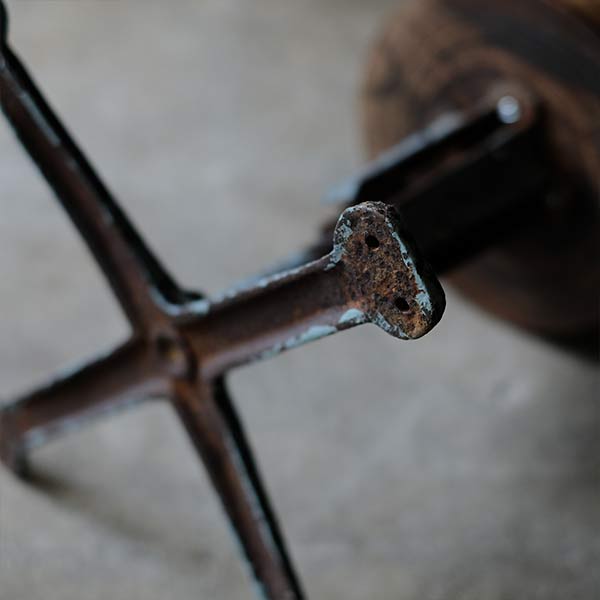 Iron-legged stool