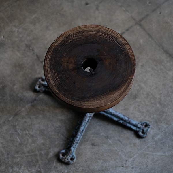 Iron-legged stool