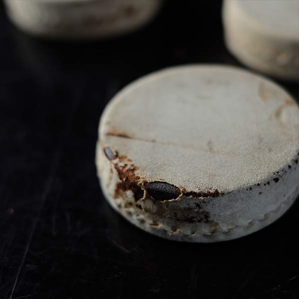 Leather-wrapped paperweight