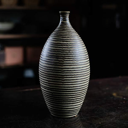 Sake bottle with circular line design