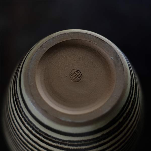 Sake bottle with circular line design
