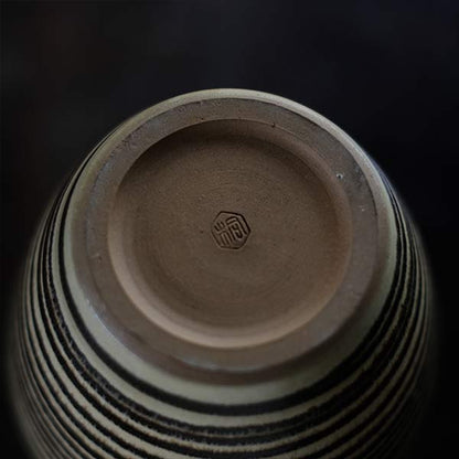 Sake bottle with circular line design