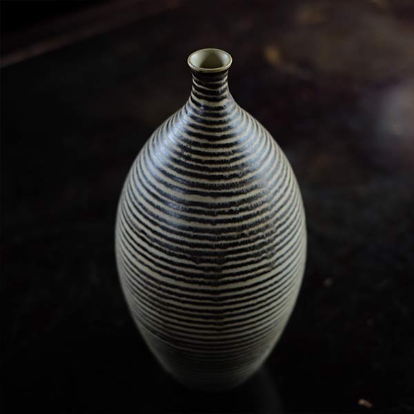 Sake bottle with circular line design