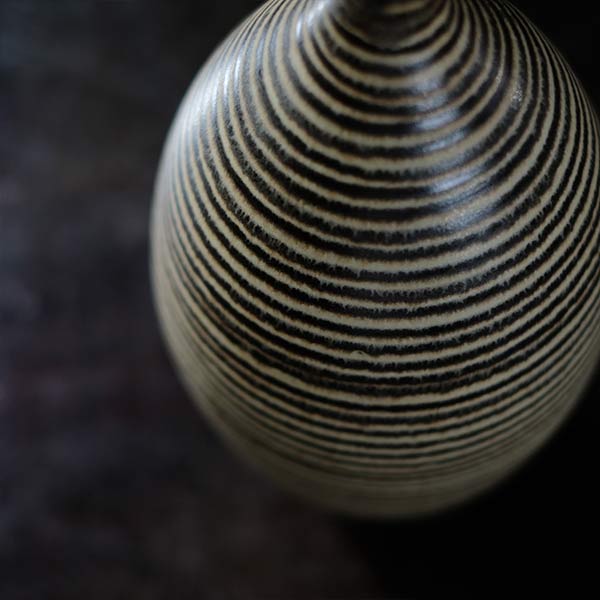 Sake bottle with circular line design