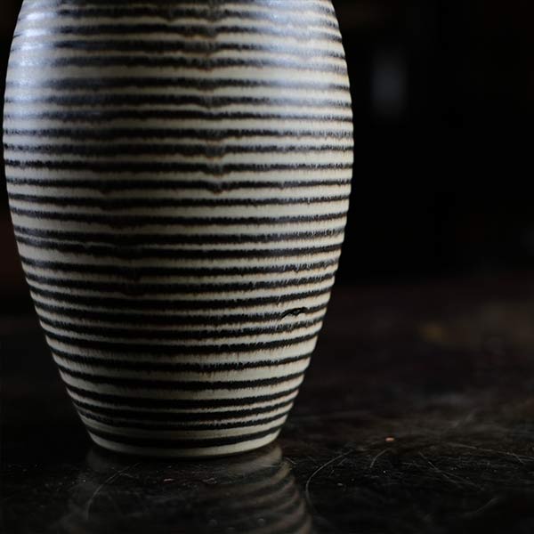 Sake bottle with circular line design