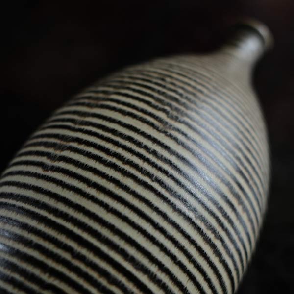Sake bottle with circular line design
