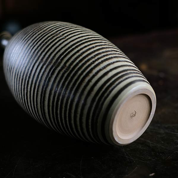 Sake bottle with circular line design