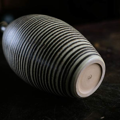Sake bottle with circular line design