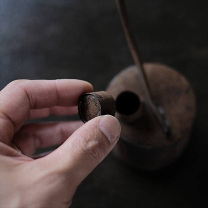 can with a funnel