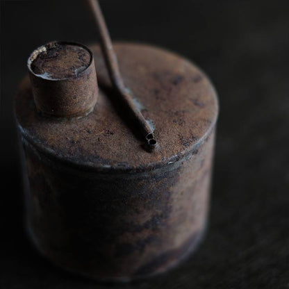 can with a funnel
