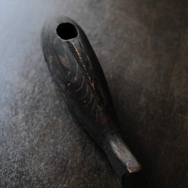 自在鉤の横木の魚