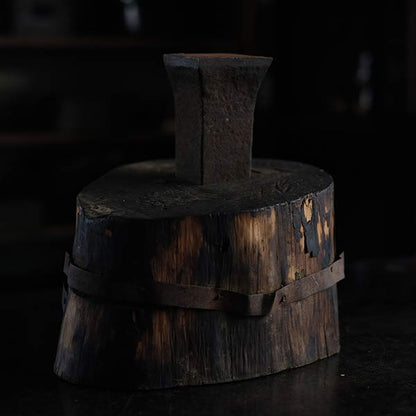 Anvil and wooden stand