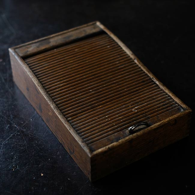 Pencil case with accordion lid