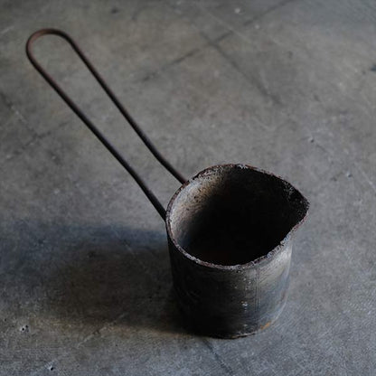 Pouring hot water for casting