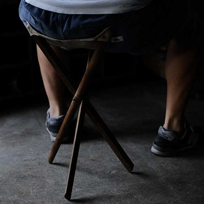 Three-legged folding chair