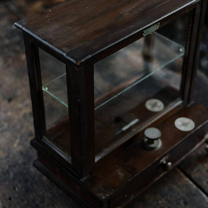 A small showcase made from a scale case (dark brown)