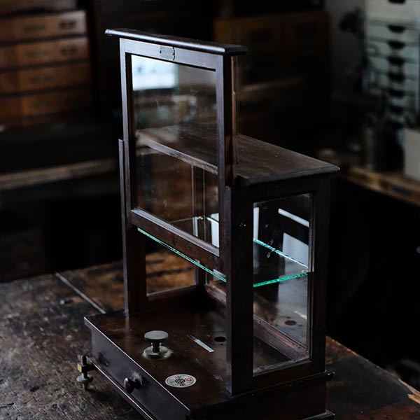 A small showcase made from a scale case (dark brown)