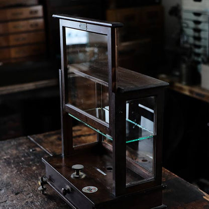 A small showcase made from a scale case (dark brown)