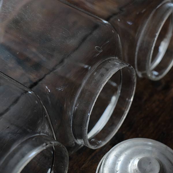 Three carefully used candy jars