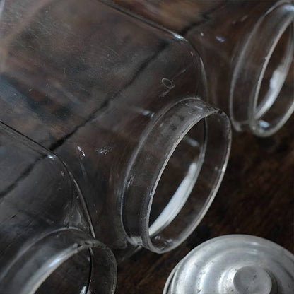 Three carefully used candy jars