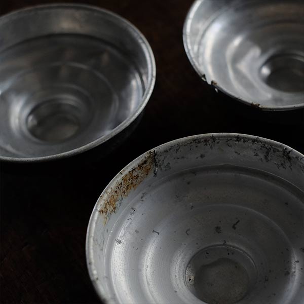 Three carefully used candy jars